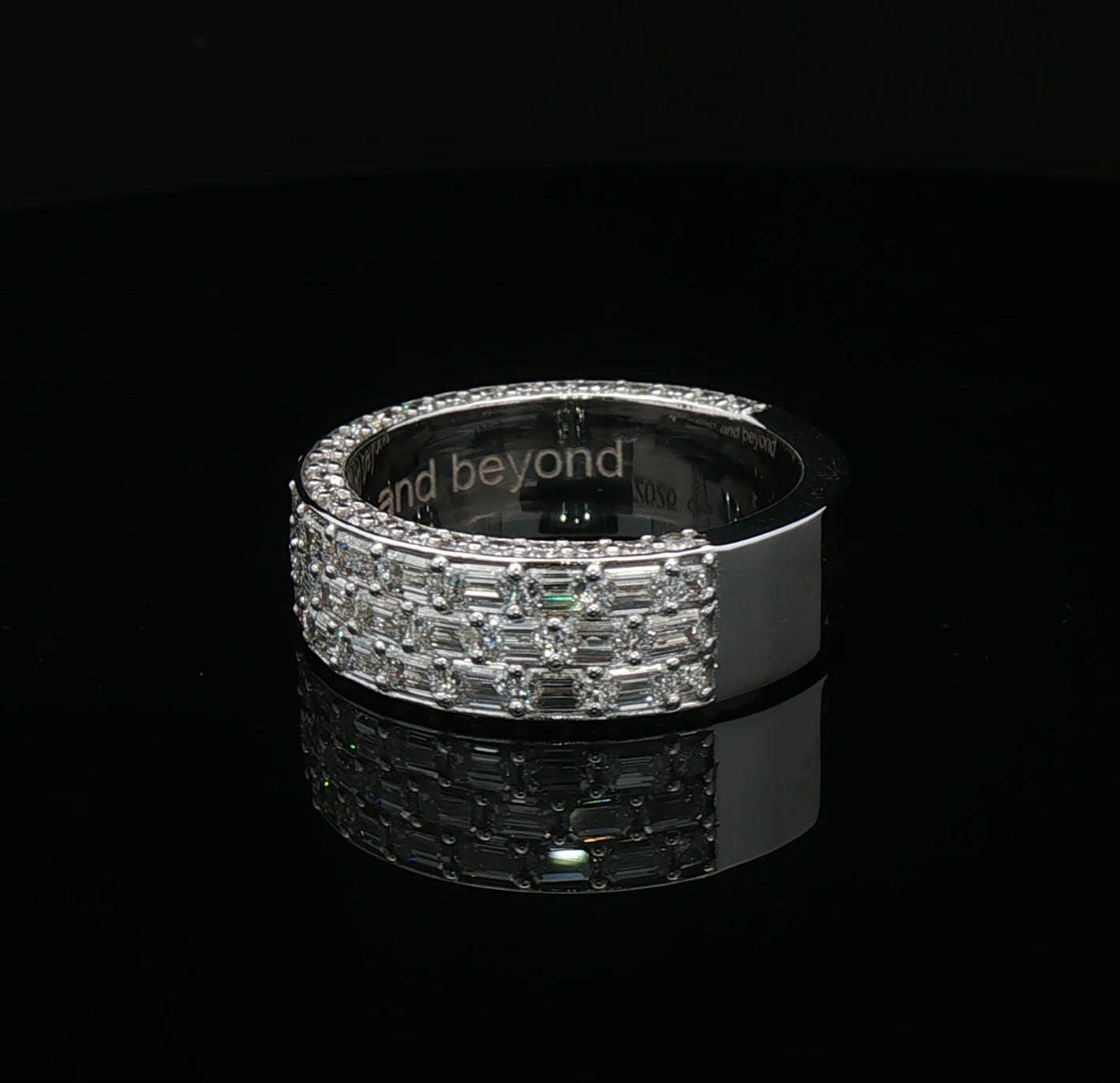Custom 3/4 fully iced emerald cut ring